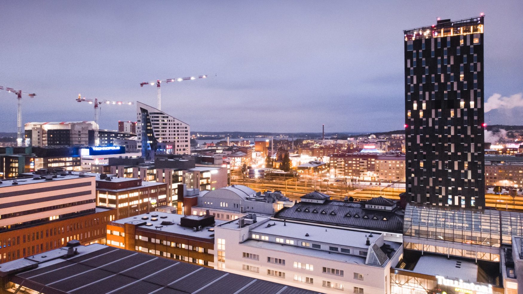 visit tampere sokos hotel torni tampere deck arena tullintori december evening 2020 city drone view laura vanzo 2